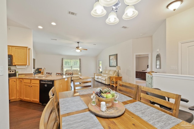 dining area featuring ceiling fan with notable chandelier, dark hardwood / wood-style floors, sink, and lofted ceiling