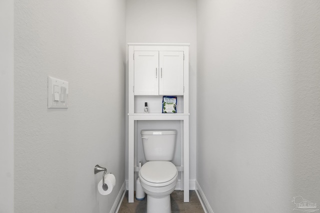 bathroom featuring toilet