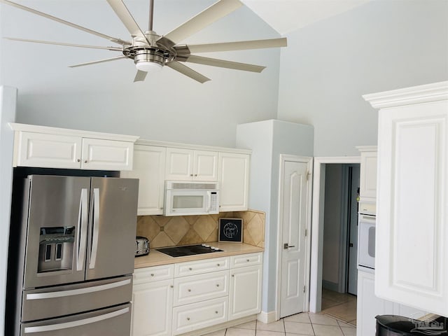1358 Windsor Park Rd, Gulf Breeze, FL 32563 - kitchen with white appliances, high vaulted ceiling, light tile patterned floors, tasteful backsplash, and light countertops