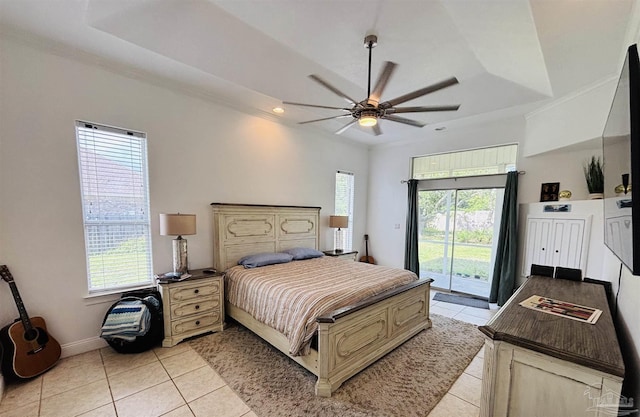 1358 Windsor Park Rd, Gulf Breeze, FL 32563 - bedroom with access to exterior, light tile patterned floors, multiple windows, a raised ceiling, and recessed lighting