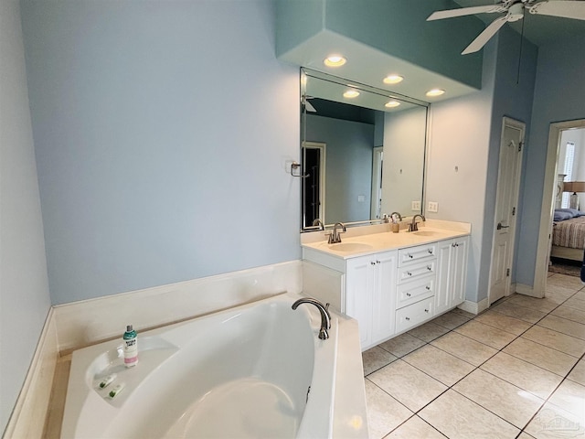 1358 Windsor Park Rd, Gulf Breeze, FL 32563 - bathroom featuring tile patterned floors, double vanity, a bath, ensuite bath, and ceiling fan