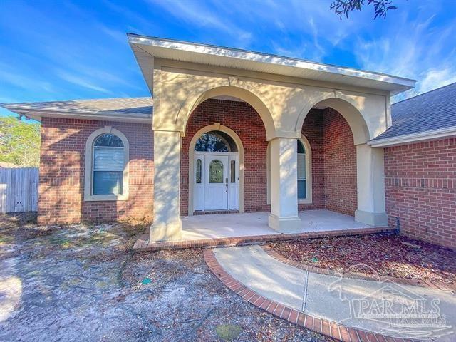 1358 Windsor Park Rd, Gulf Breeze, FL 32563 - entrance to property featuring brick siding and a shingled roof