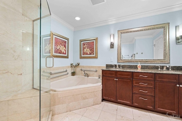 bathroom featuring vanity, crown molding, and tiled bath