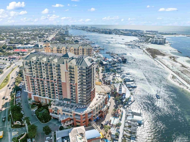 birds eye view of property featuring a water view and a view of the beach