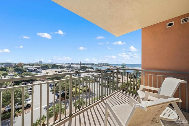 balcony featuring a water view