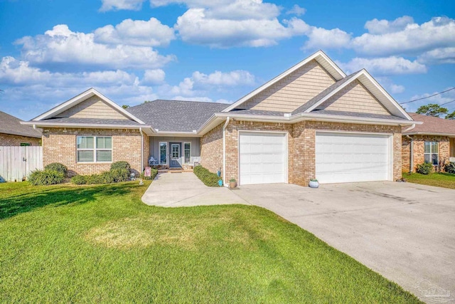 view of front facade featuring a garage and a front lawn