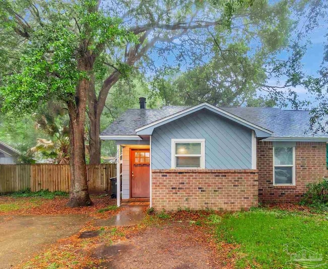 6205 E Forest Pines Dr, Pensacola, FL 32526 - view of front of property with brick siding and a shingled roof