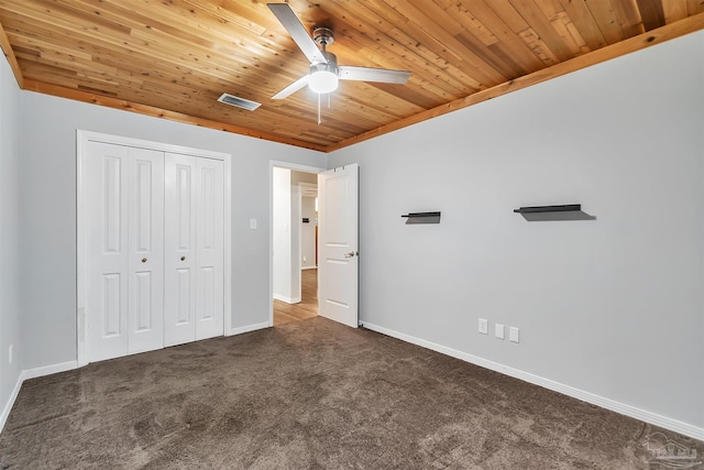 6205 E Forest Pines Dr, Pensacola, FL 32526 - unfurnished bedroom featuring carpet flooring, wooden ceiling, a closet, and a ceiling fan