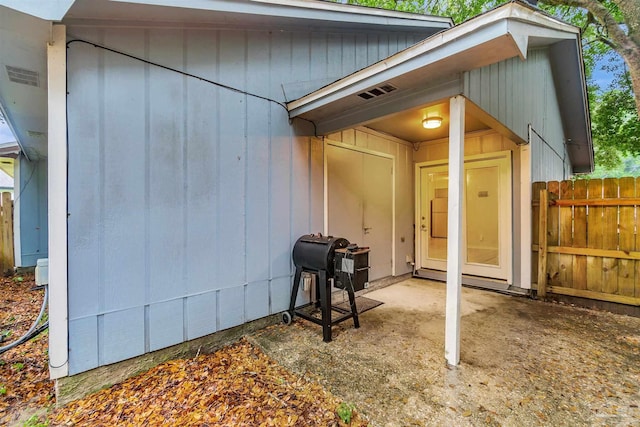 6205 E Forest Pines Dr, Pensacola, FL 32526 - doorway to property with a patio