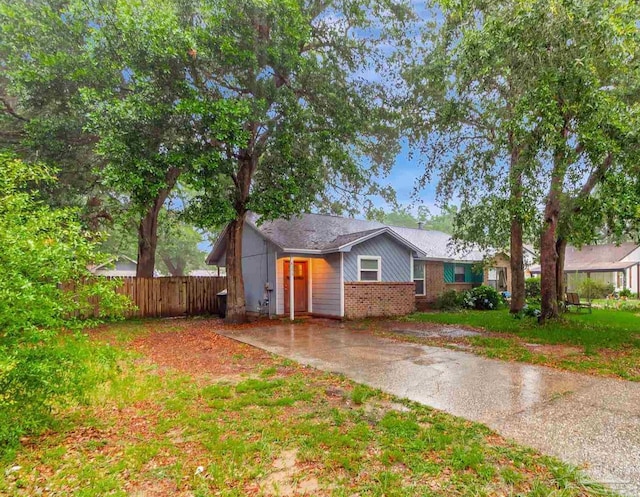 6205 E Forest Pines Dr, Pensacola, FL 32526 - view of front of house with brick siding and concrete driveway