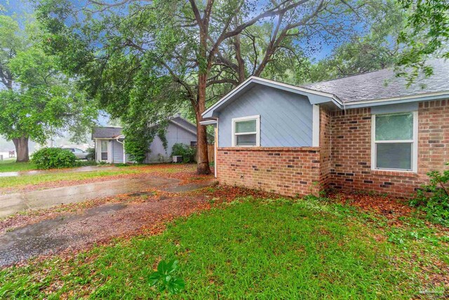 6205 E Forest Pines Dr, Pensacola, FL 32526 - view of side of property featuring brick siding