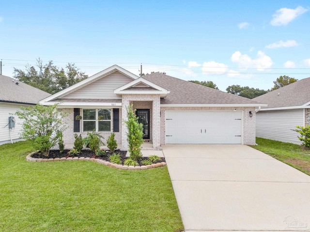 view of front of house featuring a garage and a front lawn