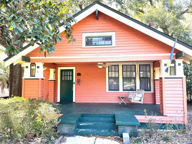 view of front of property featuring covered porch and ceiling fan