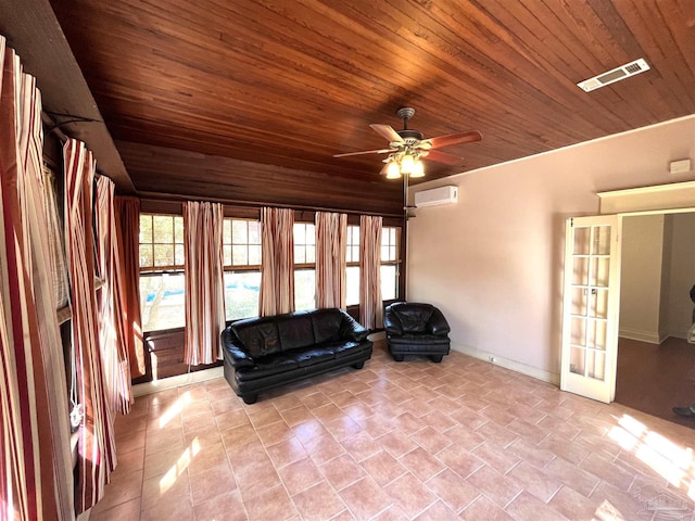 1011 N Reus St, Pensacola, FL 32501 - unfurnished room featuring visible vents, an AC wall unit, a ceiling fan, french doors, and wooden ceiling