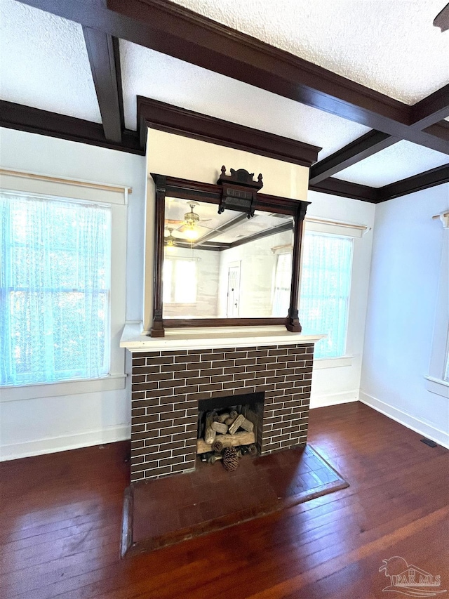 1011 N Reus St, Pensacola, FL 32501 - unfurnished living room with a fireplace, a textured ceiling, baseboards, and hardwood / wood-style floors