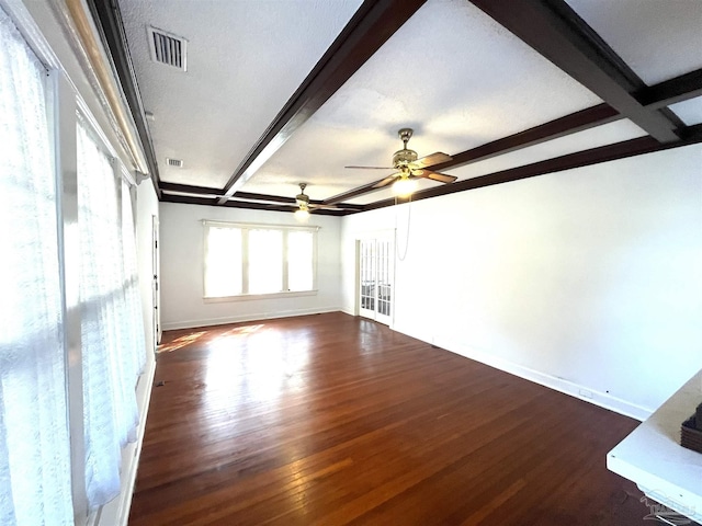 1011 N Reus St, Pensacola, FL 32501 - unfurnished room with beam ceiling, wood finished floors, visible vents, and baseboards