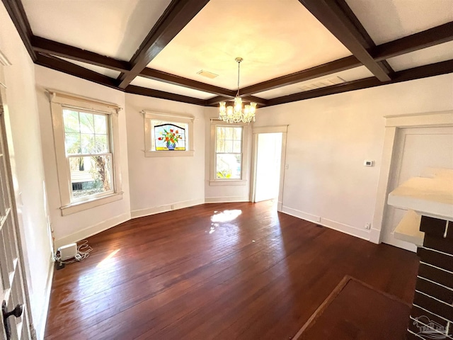 1011 N Reus St, Pensacola, FL 32501 - empty room featuring plenty of natural light, dark wood-style floors, and coffered ceiling