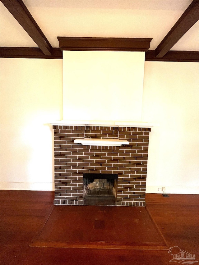 1011 N Reus St, Pensacola, FL 32501 - room details with a tiled fireplace and beam ceiling