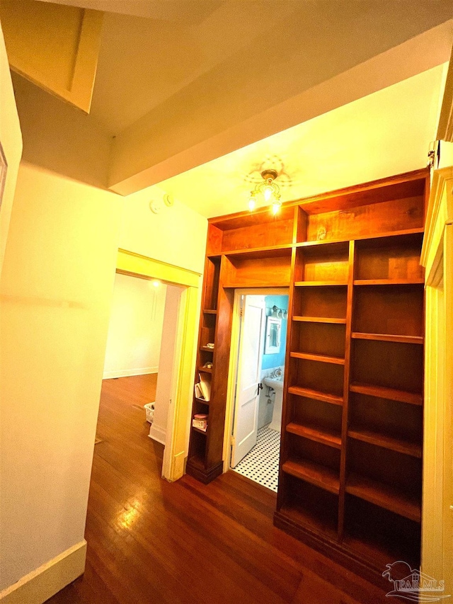 1011 N Reus St, Pensacola, FL 32501 - interior space with baseboards and dark wood-style flooring