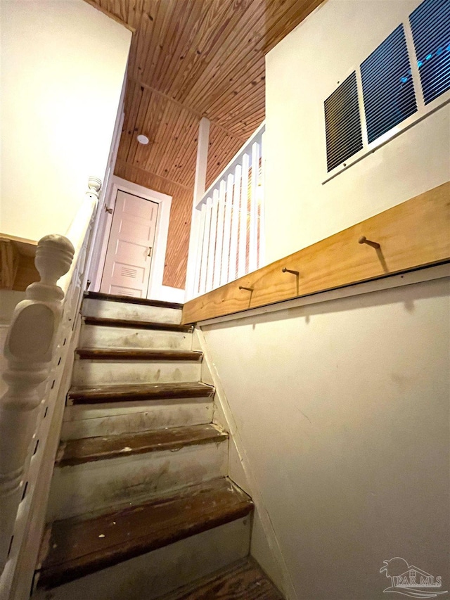 1011 N Reus St, Pensacola, FL 32501 - staircase with visible vents and wood ceiling