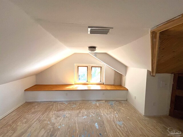1011 N Reus St, Pensacola, FL 32501 - bonus room featuring vaulted ceiling, wood finished floors, and visible vents