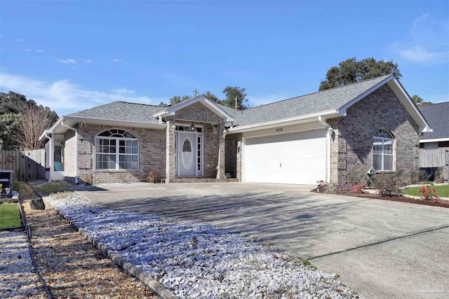 single story home with a garage