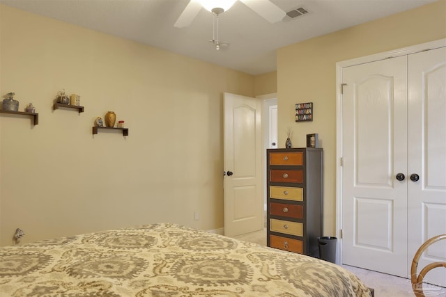 bedroom featuring a closet and ceiling fan