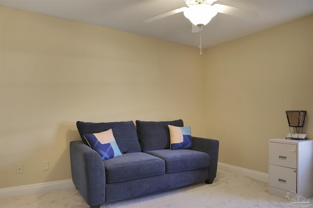 sitting room with light carpet and ceiling fan