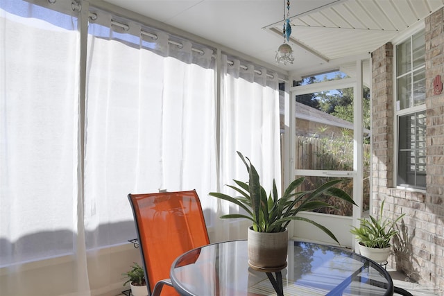 sunroom / solarium featuring a wealth of natural light