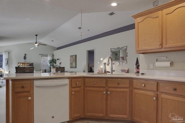 kitchen featuring a textured ceiling, vaulted ceiling, ceiling fan, sink, and dishwasher