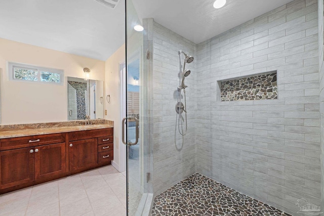 bathroom featuring vanity and walk in shower