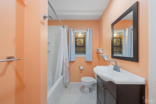 full bathroom featuring toilet, shower / bath combination with curtain, tile patterned floors, and vanity