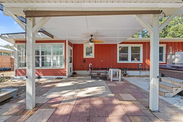 view of patio featuring ceiling fan