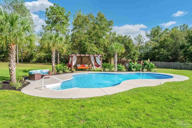 view of swimming pool featuring an outdoor hangout area, a fenced in pool, a pergola, and a yard