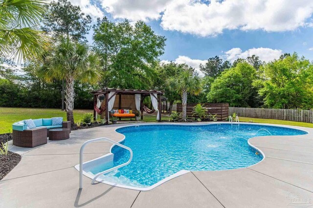 view of pool with a patio area, a fenced in pool, a fenced backyard, a pergola, and outdoor lounge area