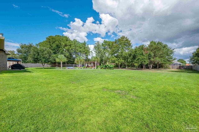 view of yard with fence