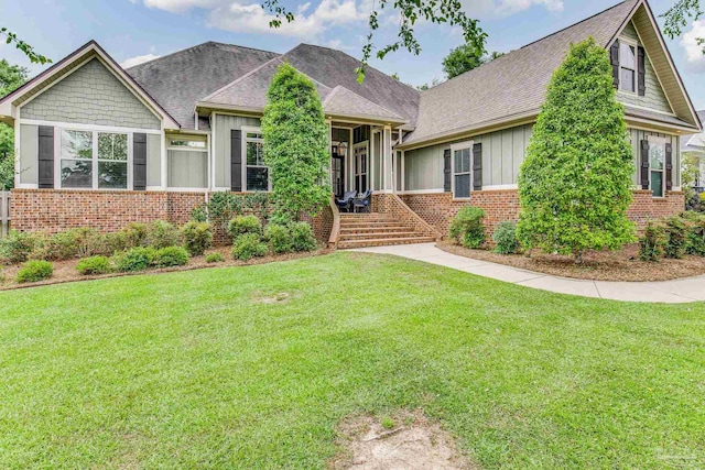 view of front of home with a front yard