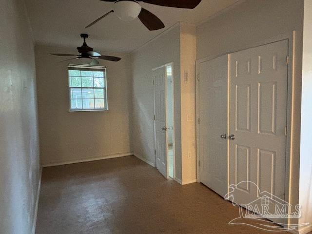 empty room featuring ceiling fan