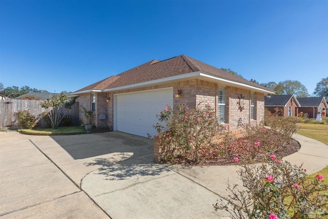 view of side of property with a garage