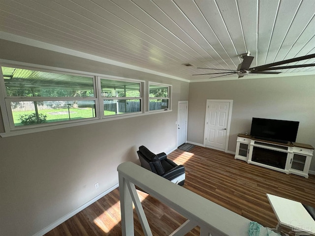 unfurnished office with wood ceiling, ceiling fan, and dark wood-type flooring