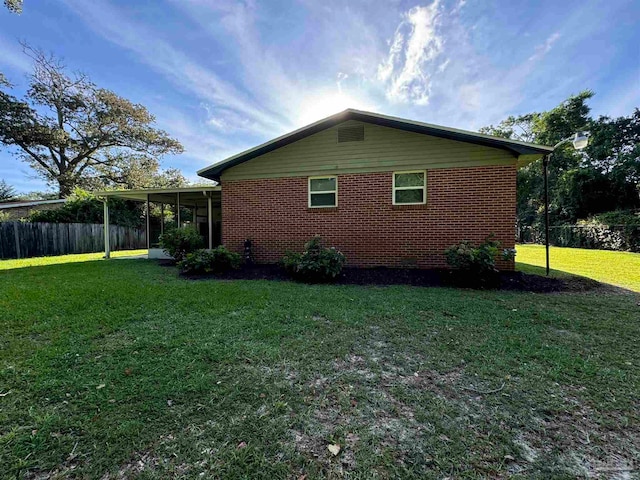 view of property exterior featuring a yard