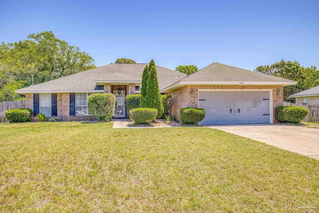 single story home featuring a front lawn and a garage