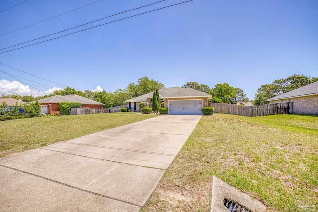 single story home with a garage and a front lawn