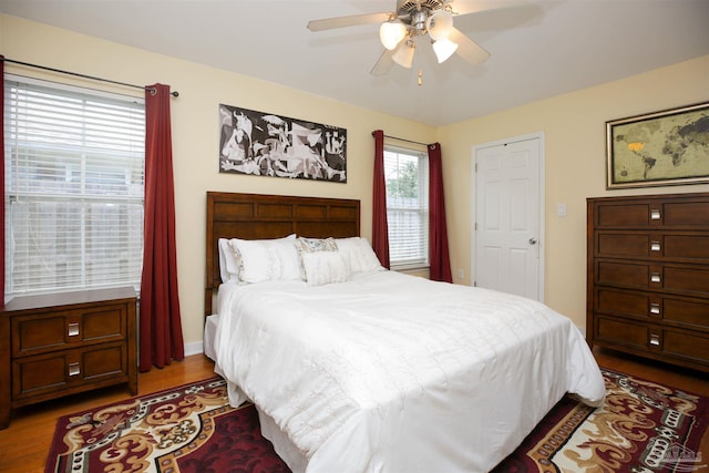 bedroom featuring ceiling fan and light hardwood / wood-style flooring