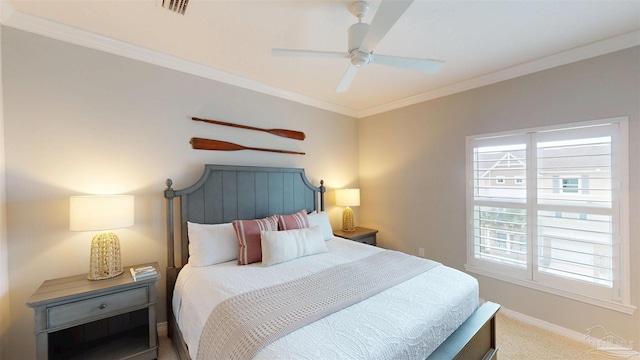 bedroom with baseboards, visible vents, carpet floors, and ornamental molding