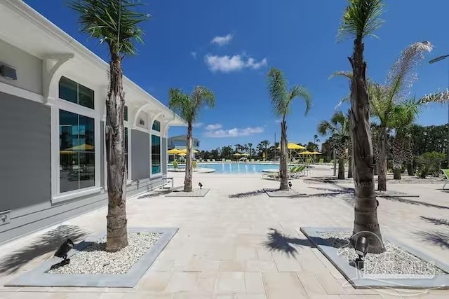 pool featuring a patio area