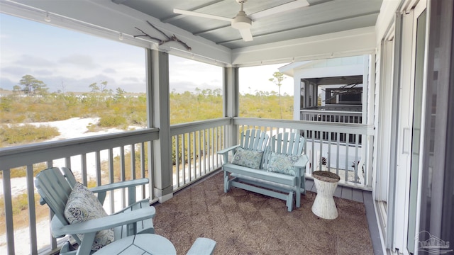 sunroom / solarium with ceiling fan