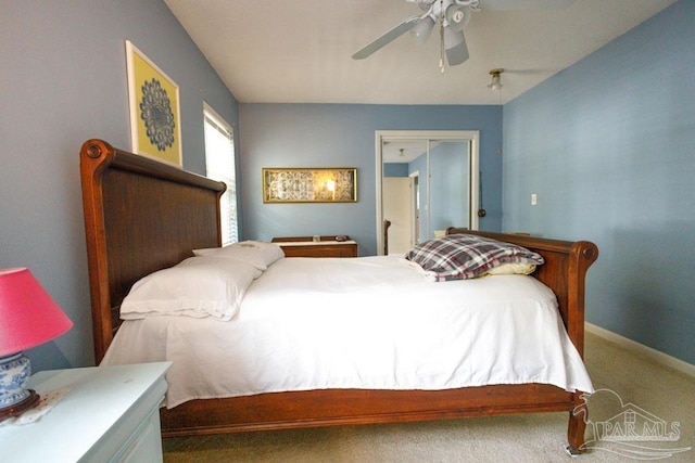 carpeted bedroom with ceiling fan