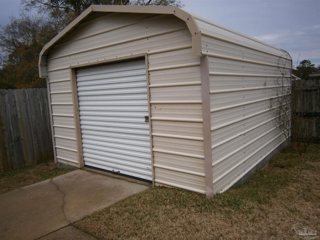 view of outbuilding featuring a garage