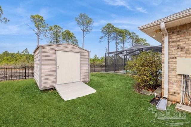 view of outbuilding with a yard